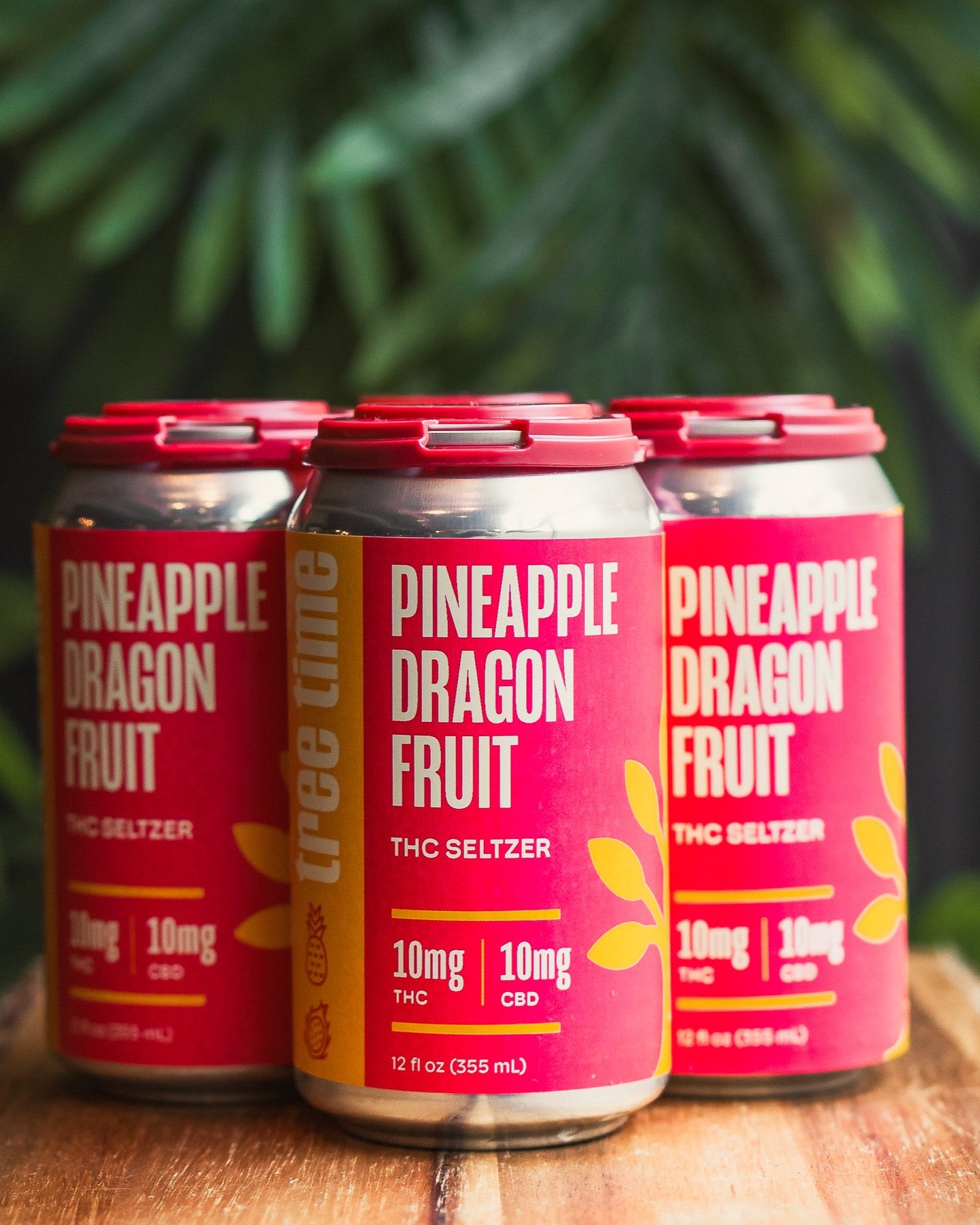 4-pack of Tree Time Pineapple Dragon Fruit THC seltzers – refreshing tropical hemp beverages for mindful relaxation.